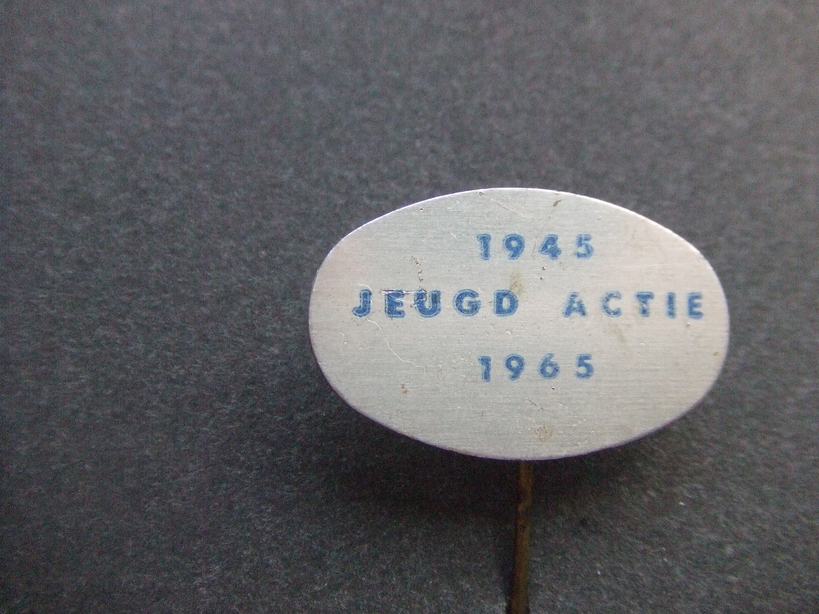 Jeugd -actie jubileum 1945-1965 blauwe letters